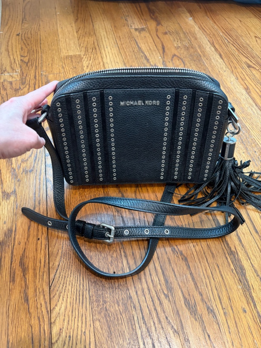 Michael Kors Black Leather Crossbody with Silver Eyelets and Tassel